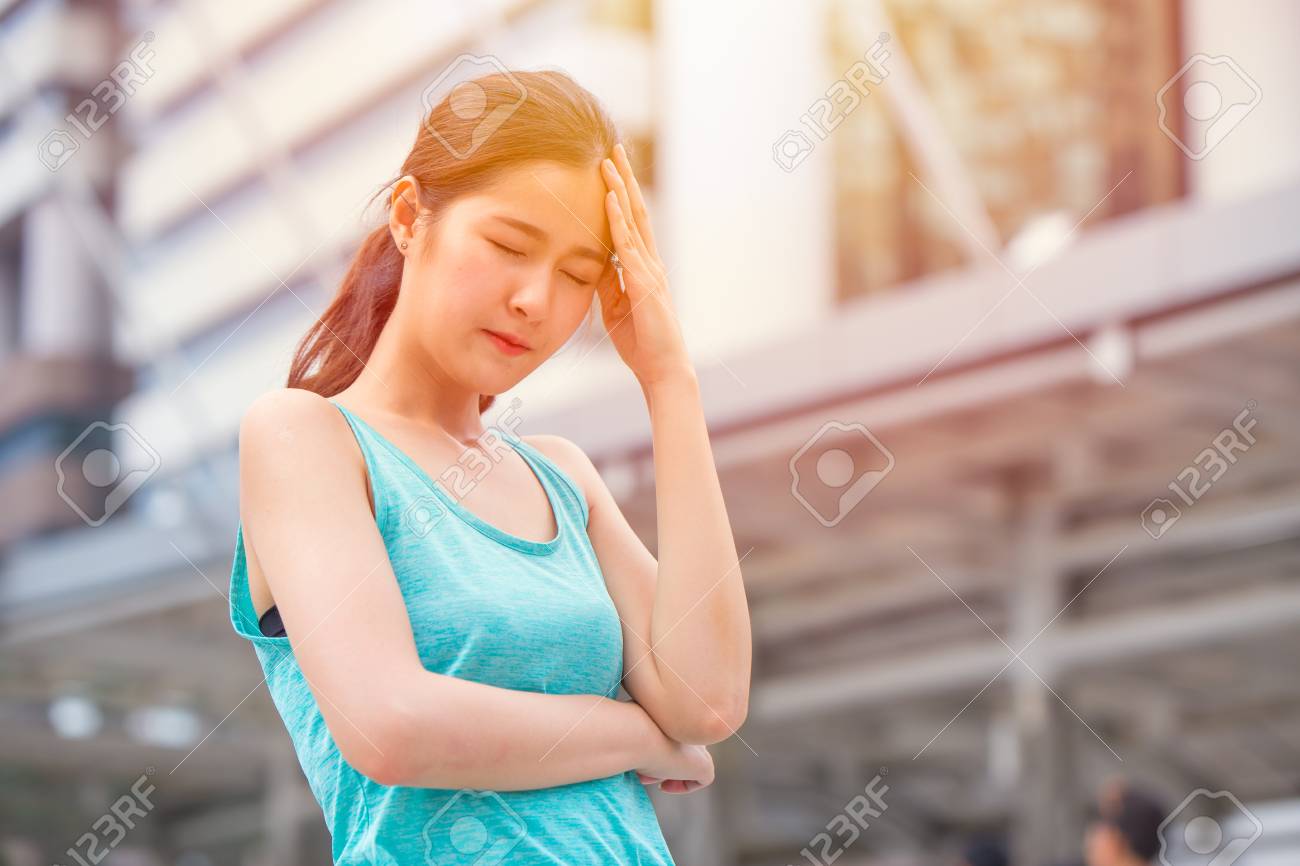 Girl teen headache from sun stroke sunny hot day heat migraine pain. - 118466794 Girl teen headache from sun stroke sunny hot day heat migraine pain. - 118466794