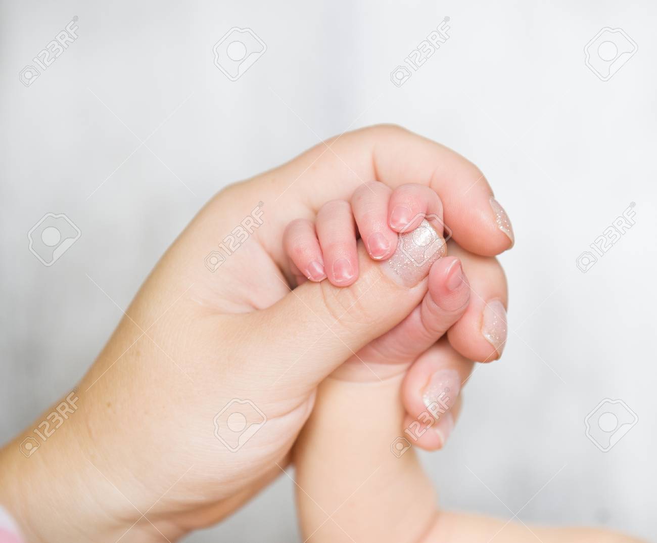 Newborn Baby Hand In Mom S Hand Stock Photo Picture And Royalty Free Image Image