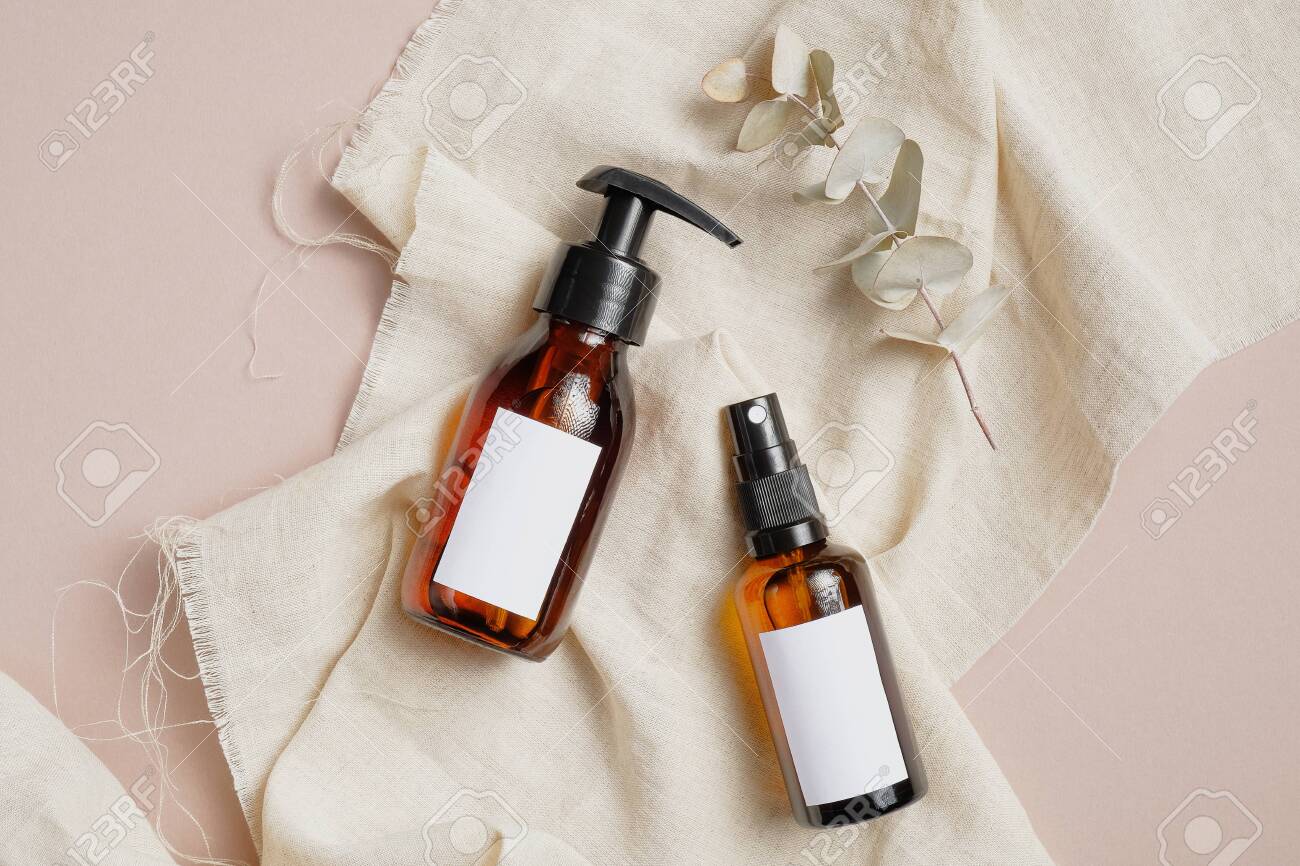 Download Brown Amber Glass Bottles Mockup On Beige Fabric Flat Lay Top Stock Photo Picture And Royalty Free Image Image 159394786