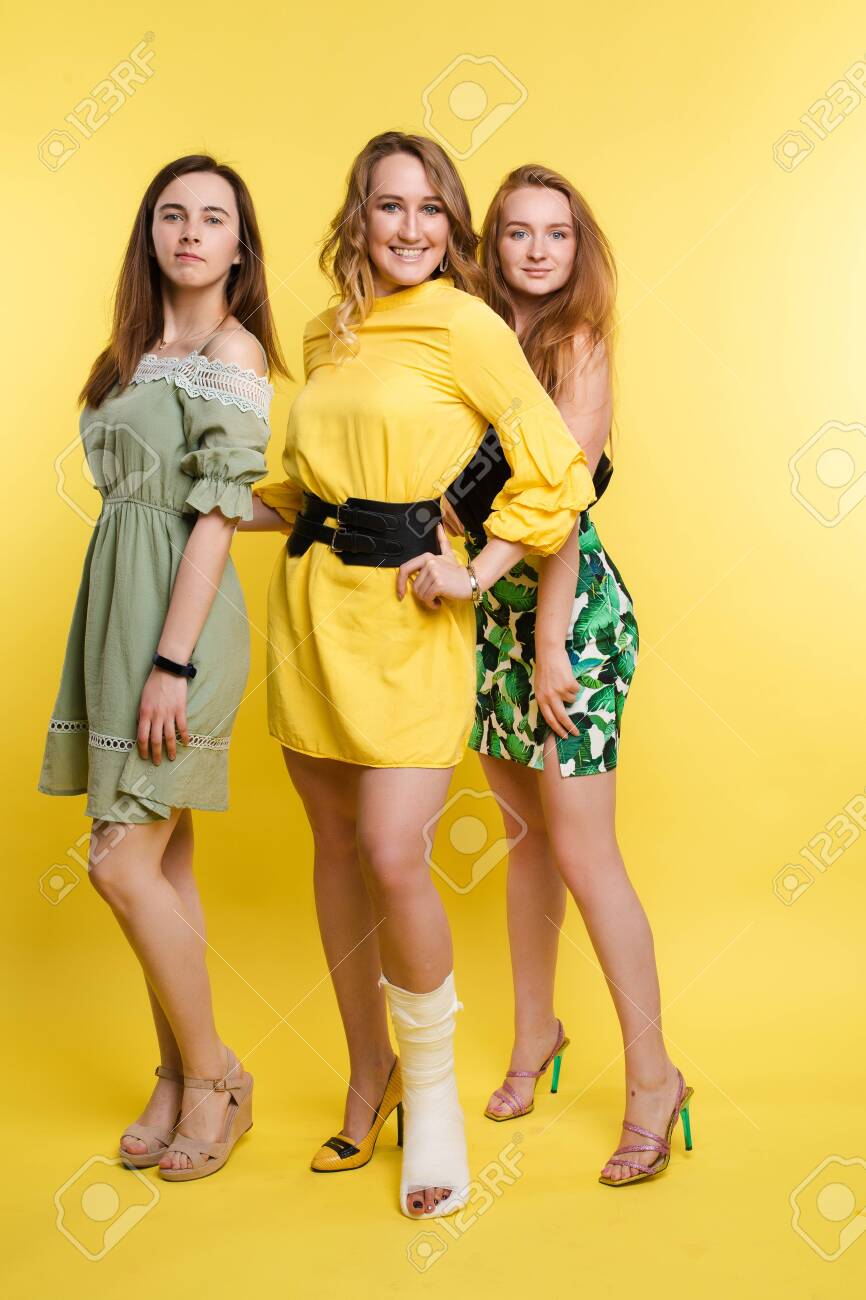 yellow dress with black belt
