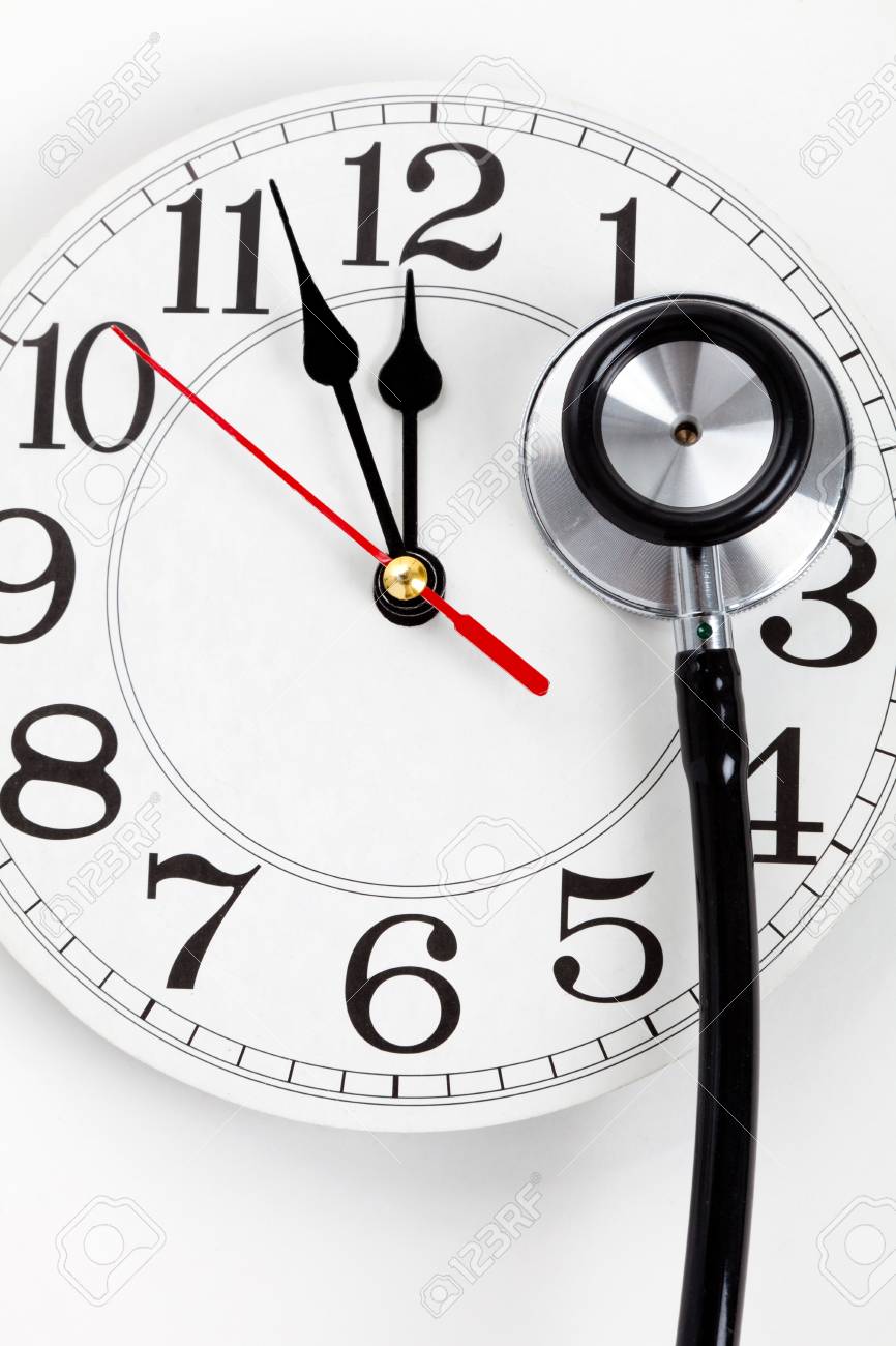 stethoscope and clock concept of time problems stock photo picture