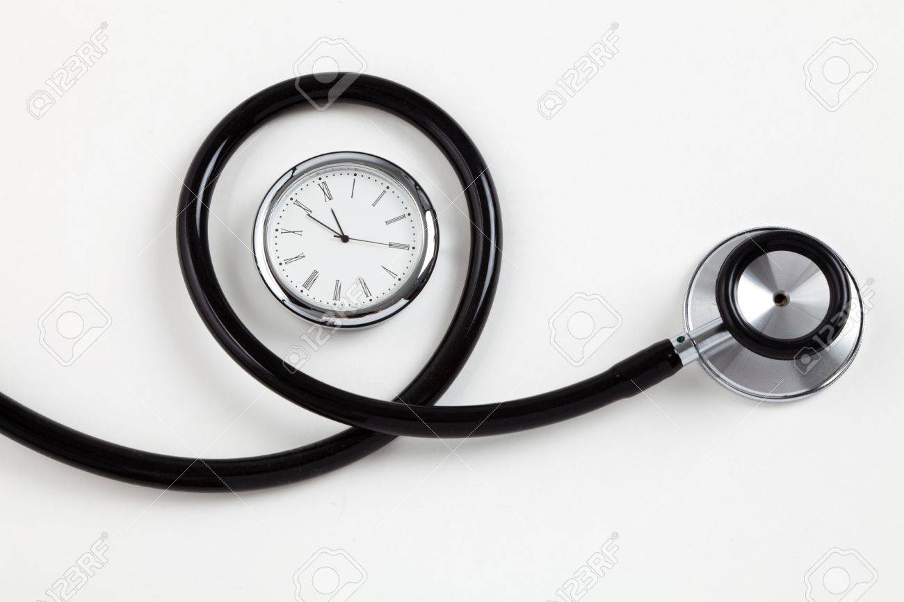 stethoscope and clock concept of time problems stock photo picture