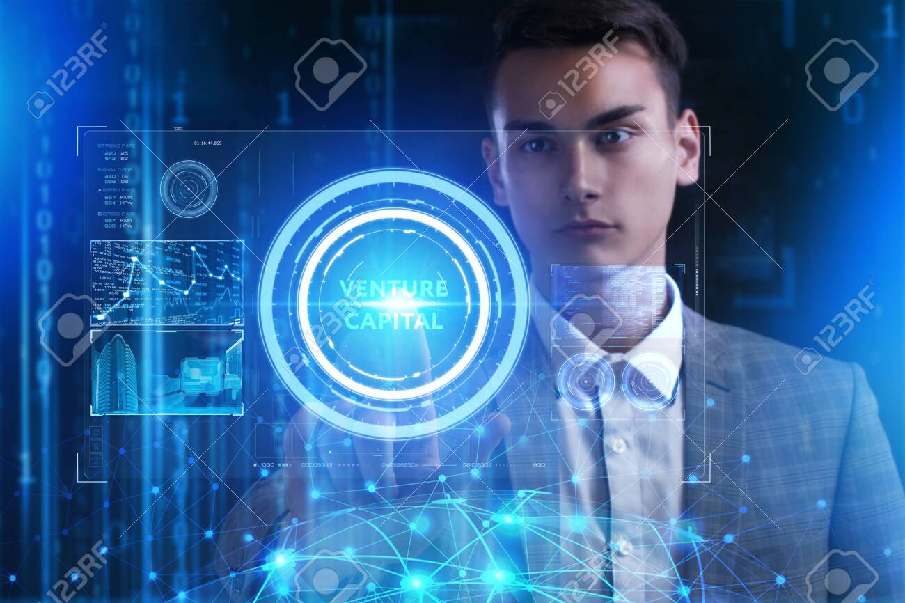 The concept of business, technology, the Internet and the network. A young entrepreneur working on a virtual screen of the future and sees the inscription: Venture capital - 121740377 The concept of business, technology, the Internet and the network. A young entrepreneur working on a virtual screen of the future and sees the inscription: Venture capital - 121740377