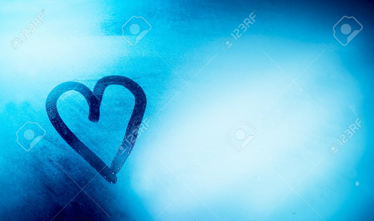 Love is in the air, heart shaped drawing on the misted-up window, abstract blue background, romantic winter holidays concept, happy Valentines day - 94607481 Love is in the air, heart shaped drawing on the misted-up window, abstract blue background, romantic winter holidays concept, happy Valentines day - 94607481