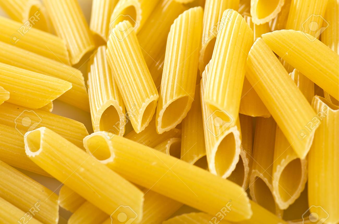italian pasta maccaroni close up on the white stock photo picture