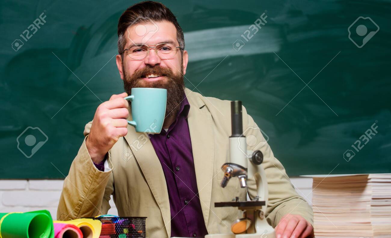 chemistry lesson. mature teacher at blackboard. Towards knowledge. good morning coffee. back to school. using microscope. biology education. happy bearded man hipster drink tea at school - 136794441 chemistry lesson. mature teacher at blackboard. Towards knowledge. good morning coffee. back to school. using microscope. biology education. happy bearded man hipster drink tea at school - 136794441