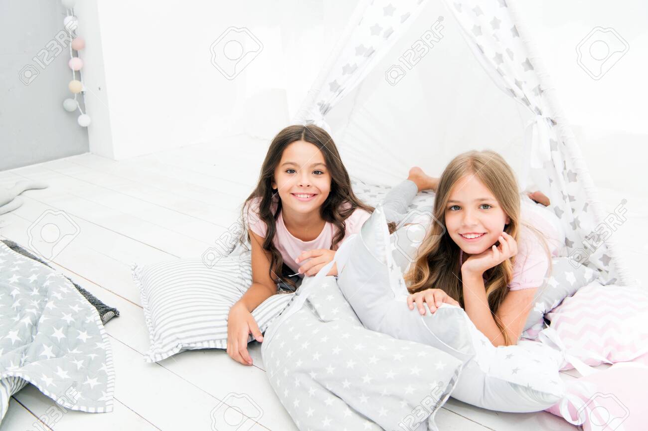 Pajamas Party For Kids. Siblings Best Friends. Sisters Or Best Friends  Spend Time Together In Bedroom. Girls Having Fun Together. Girlish Leisure. Sisters  Friends Share Gossips Having Fun At Home Stock Photo,