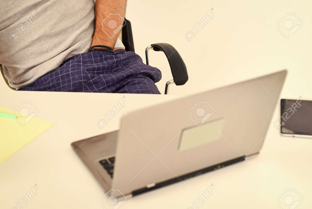 Man watching online porn with hand in pants