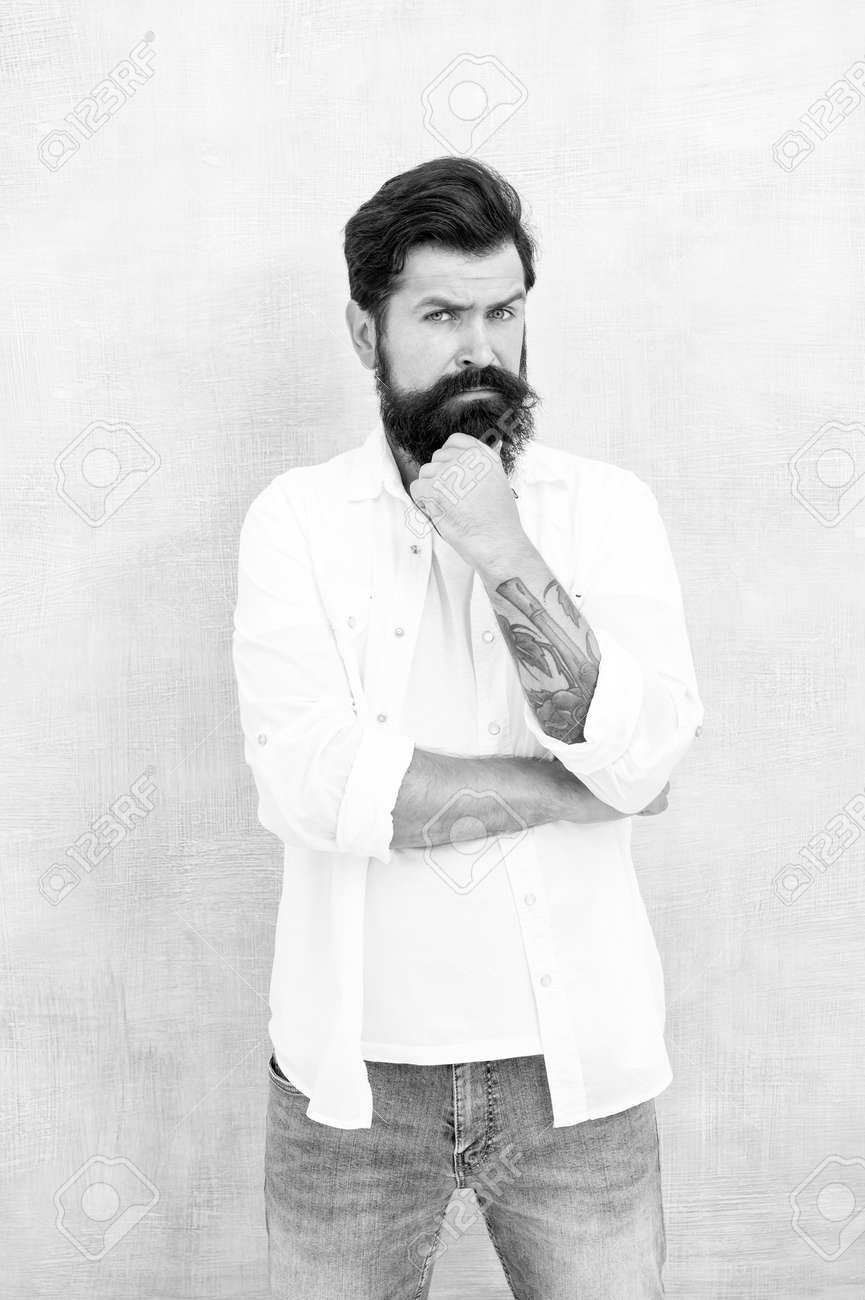 Brutal macho gray background. Casual style daily life. bearded man radiate masculinity. physical attractiveness. handsome hipster relax. male fashion trends. summer collection. Simple and casual - 159282245 Brutal macho gray background. Casual style daily life. bearded man radiate masculinity. physical attractiveness. handsome hipster relax. male fashion trends. summer collection. Simple and casual - 159282245