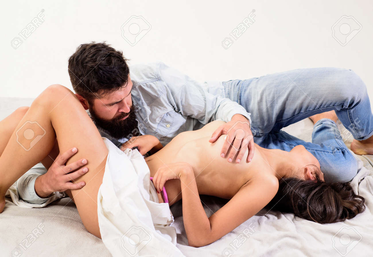 Couple Make Love Have Sex. Lover And Sexy Sensual Naked Female Body Cuddling. Couple Intimate Sensual Touch Senses. Sex And Love Concept image