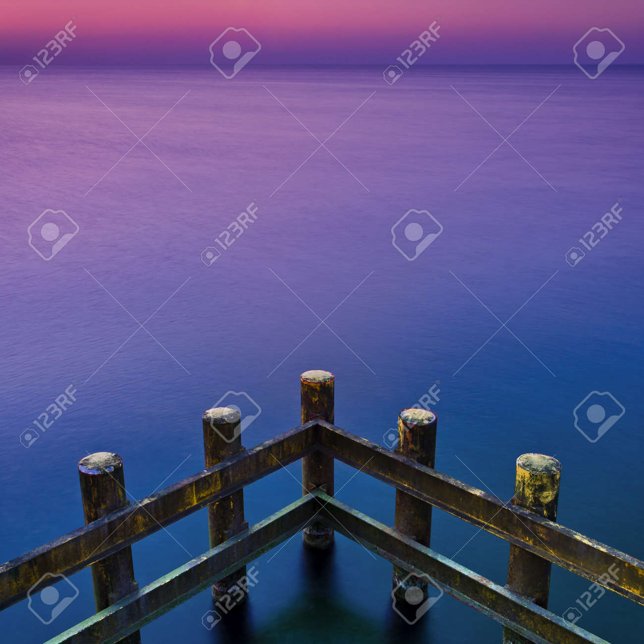 CONSTRUCTION ON THE COAST - Palisade protecting against sea waves - 169541040 CONSTRUCTION ON THE COAST - Palisade protecting against sea waves - 169541040