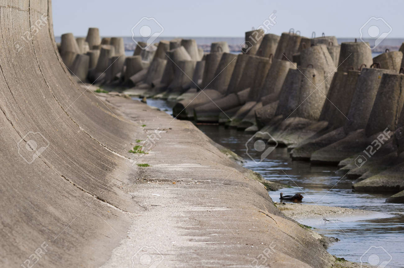 DOLOS AND BREAKWATER - Engineering structures protecting the port against sea waves - 171214269 DOLOS AND BREAKWATER - Engineering structures protecting the port against sea waves - 171214269