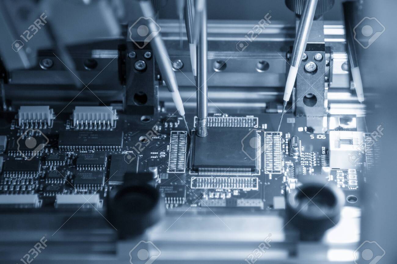 The main board assembly line operation by robotics system control by computer program. The hi-technology electronics industrial production line by automatic robot system. - 143976025 The main board assembly line operation by robotics system control by computer program. The hi-technology electronics industrial production line by automatic robot system. - 143976025
