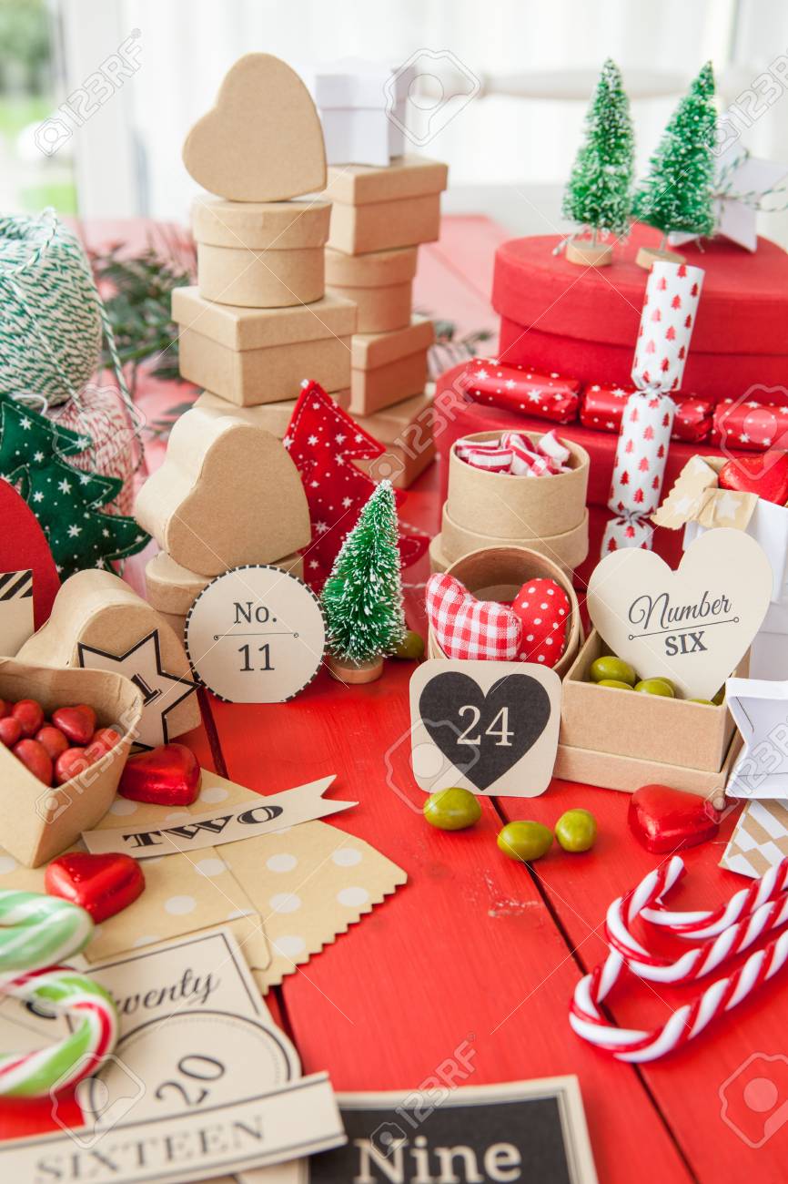 advent calender with gift bags and boxes filled with candy stock