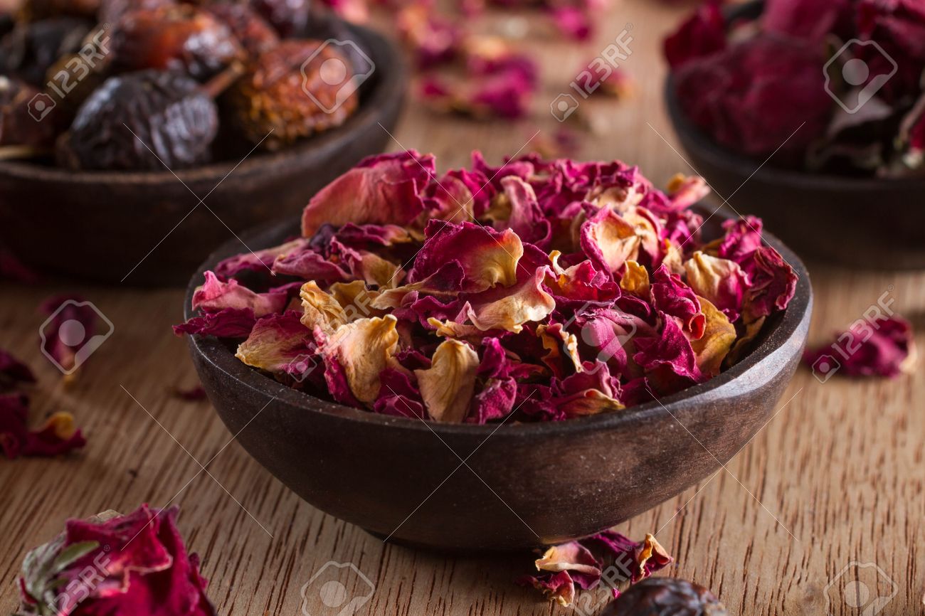 Dried rose petals: for tea, alternative medicine, pot-pourri. Copy space. - 23949194 Dried rose petals: for tea, alternative medicine, pot-pourri. Copy space. - 23949194