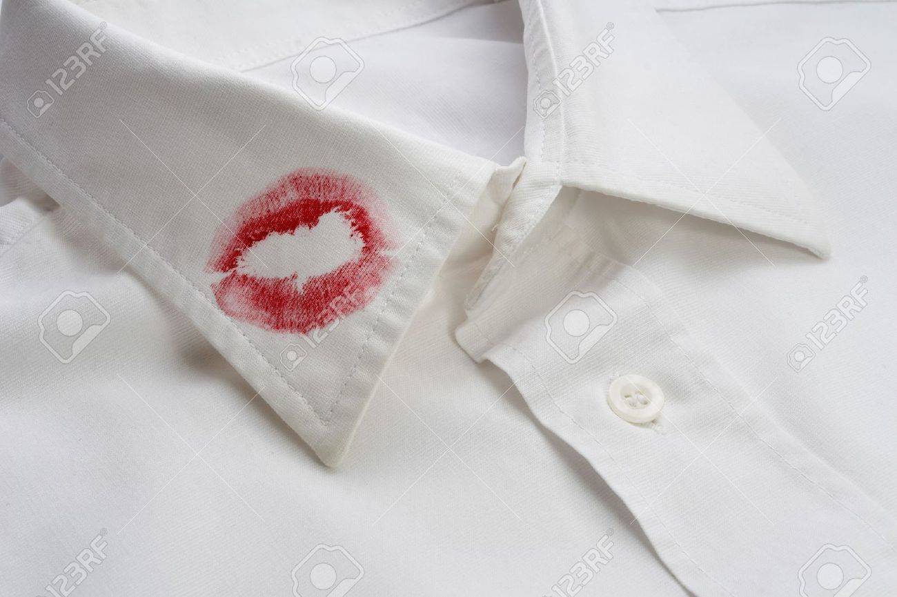 close up of white shirt and red lipstick on it - 4757579 close up of white shirt and red lipstick on it - 4757579