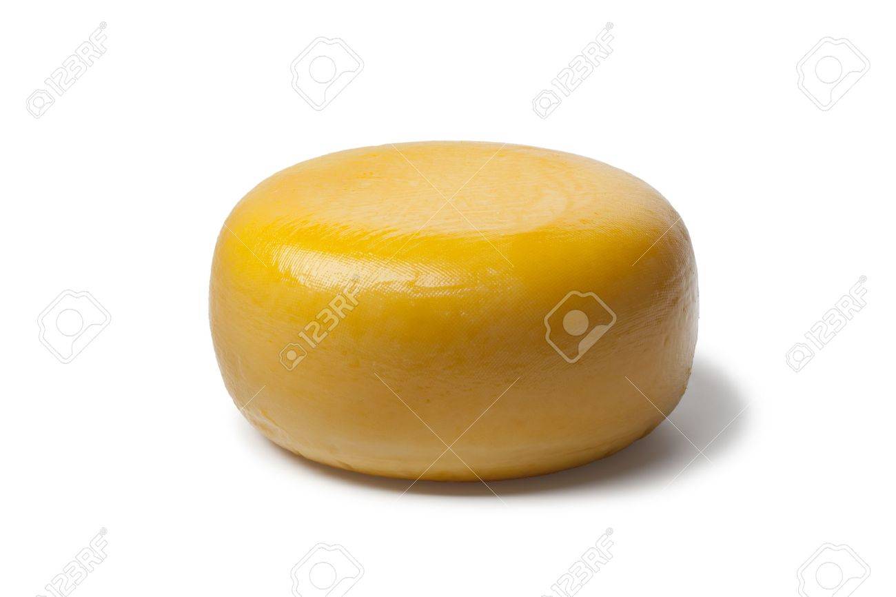 Whole yellow Dutch Gouda cheese on white background - 13598090 Whole yellow Dutch Gouda cheese on white background - 13598090