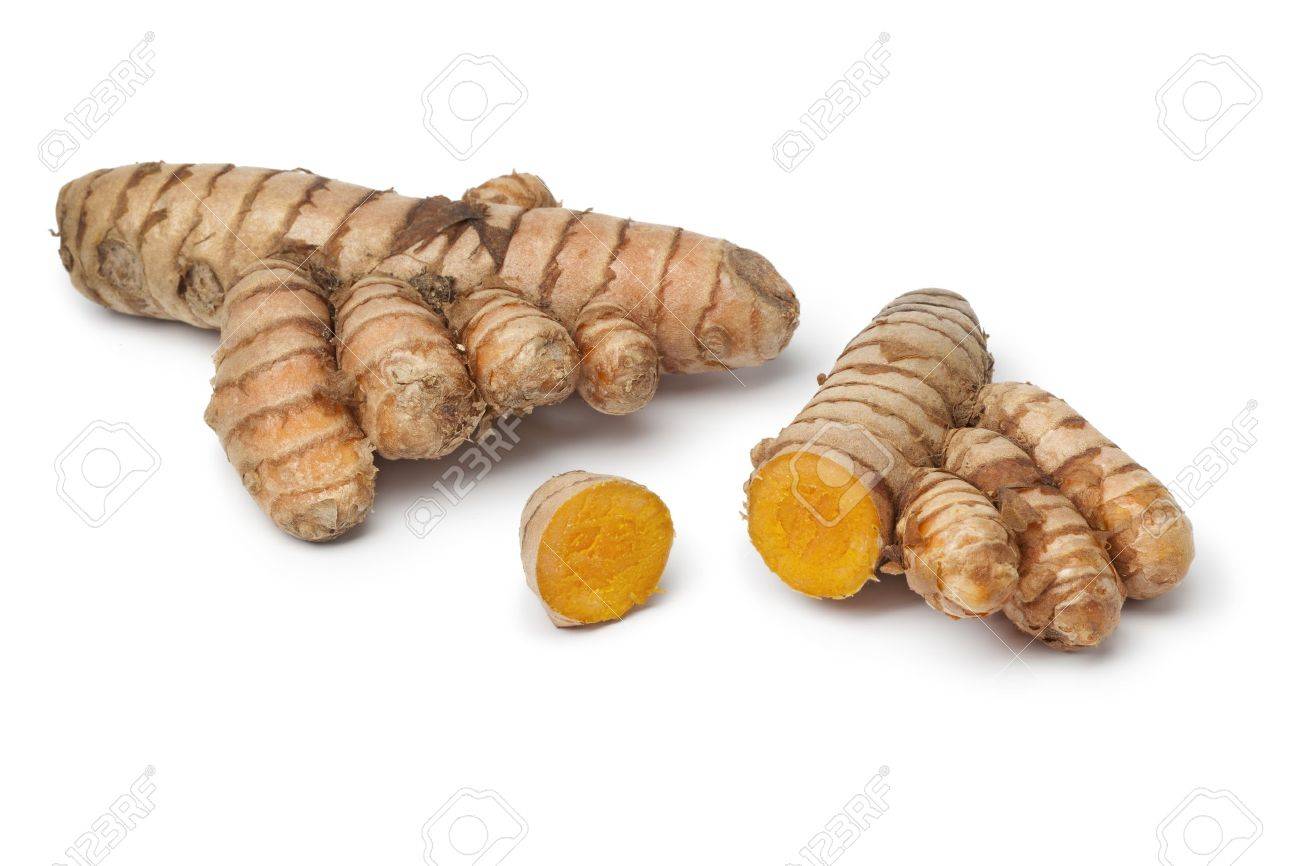 Fresh curcuma root with slices on white background - 17994720 Fresh curcuma root with slices on white background - 17994720