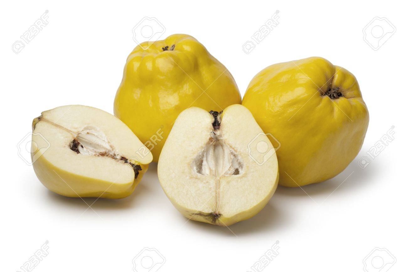 Fresh yellow whole and half Quinces on white background - 18223980 Fresh yellow whole and half Quinces on white background - 18223980