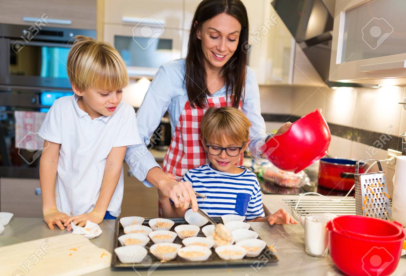 Mother And Children Baking Together Stock Photo, Picture And ...
