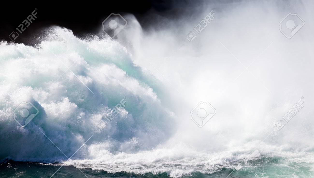 Dramatic Background Image Of Crashing Wall Of Flood Water Stream Breaking  With Flying Spray Stock Photo, Picture and Royalty Free Image. Image  24443340., image size:1300x737