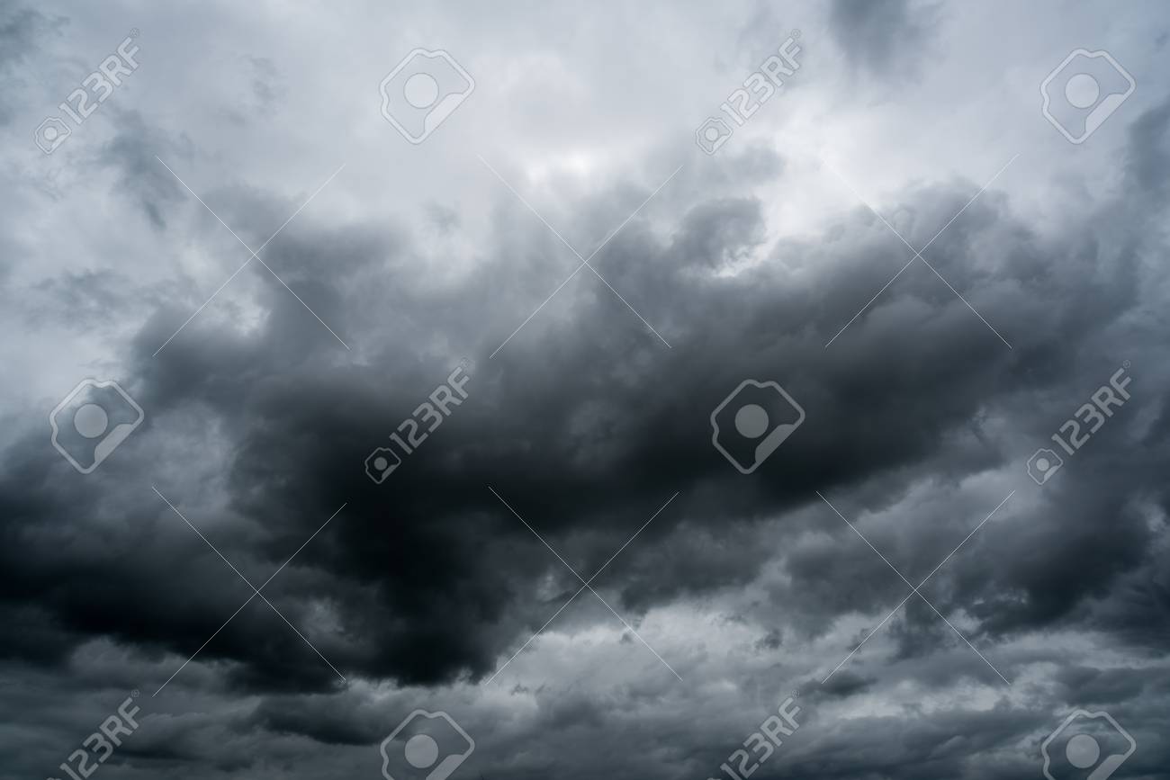 Clouds With Background Sunlight Through Very Dark Clouds Background Stock Photo Picture And Royalty Free Image Image