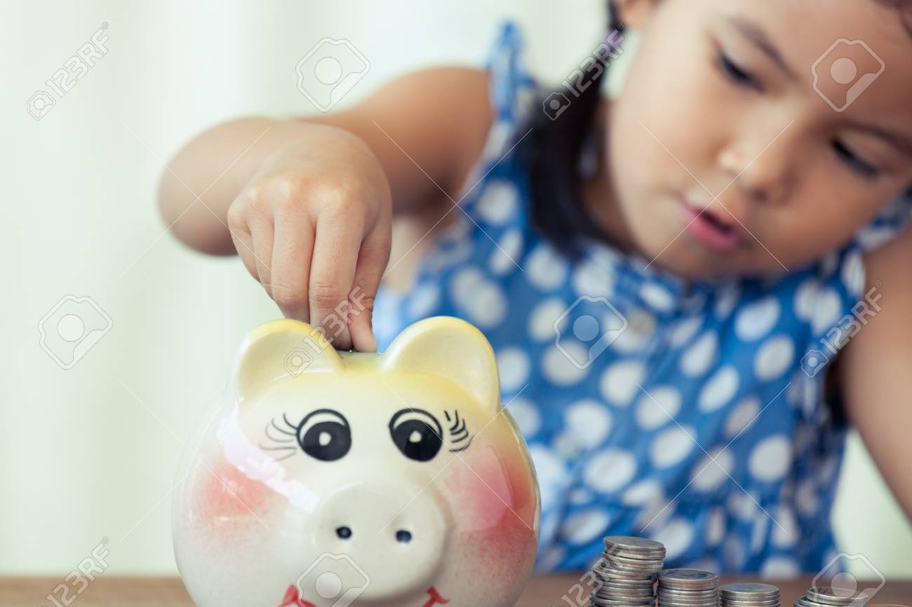 kids saving piggy bank saving money child asian little girl putting coin into piggy bank in vintage color tonekid saving asian little girl putting coin into in vintage kids saving piggy bank saving money child asian little girl putting coin into piggy bank in vintage color tonekid saving asian little girl putting coin into in vintage