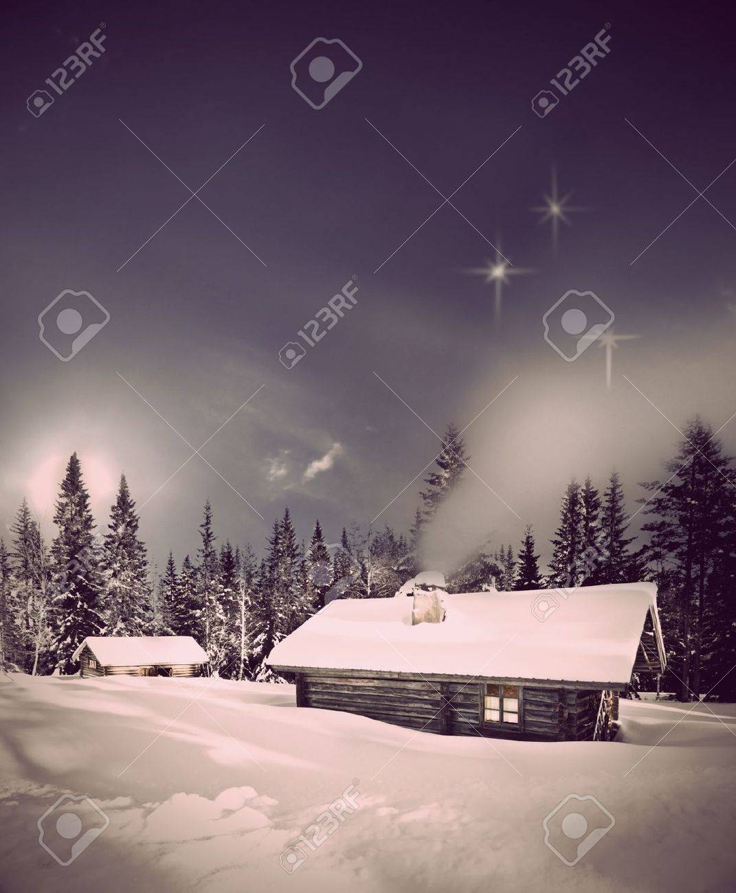 Remote log cabin in winter evening with stars in sky - 11888459 Remote log cabin in winter evening with stars in sky - 11888459