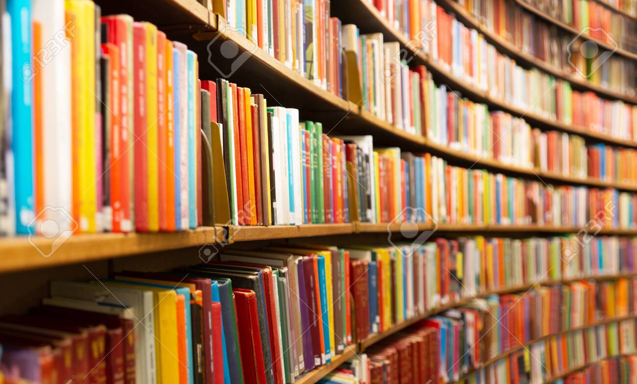 Library with many shelves and books, diminishing perspective and shallow dof - 131203327 Library with many shelves and books, diminishing perspective and shallow dof - 131203327