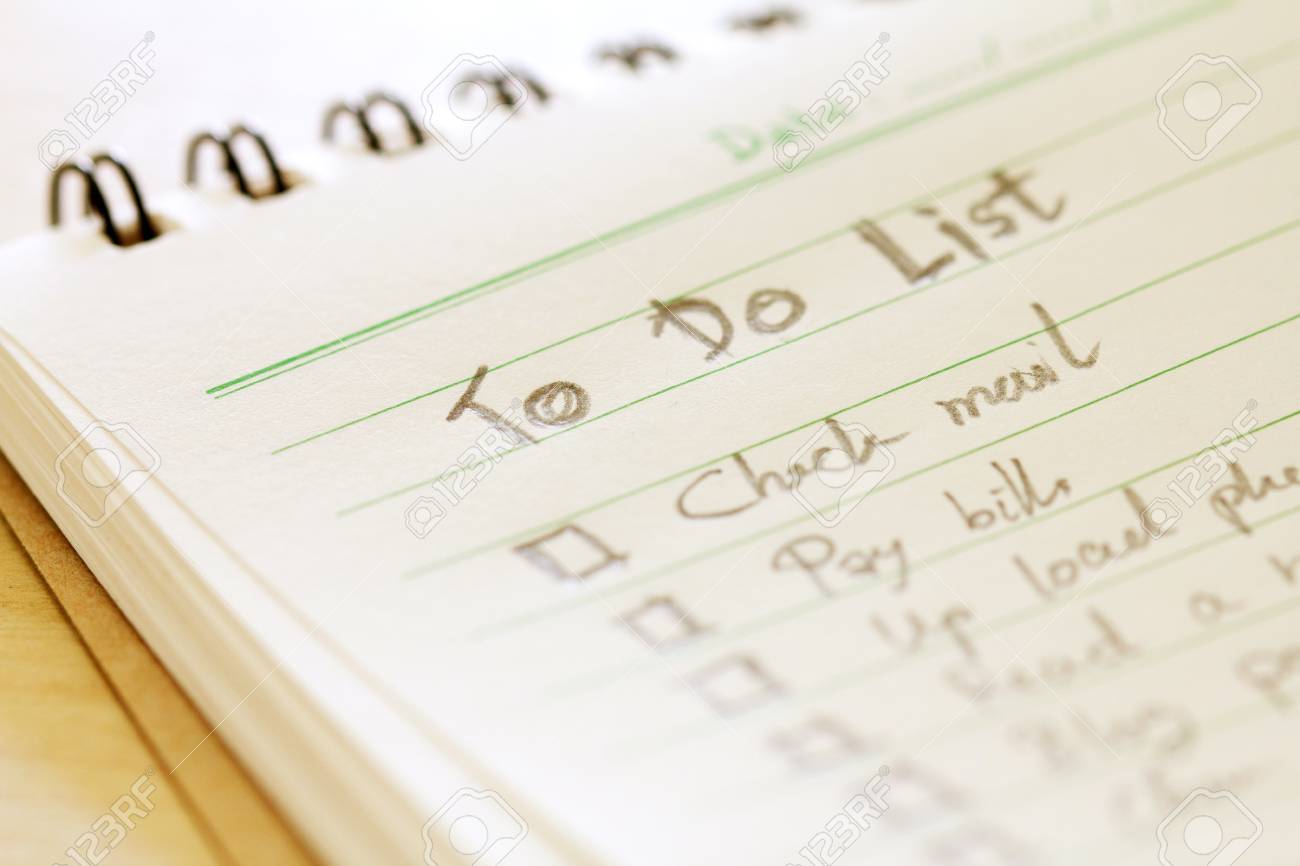Close Up Handwritten To Do List Plan In A Small Note Book - 