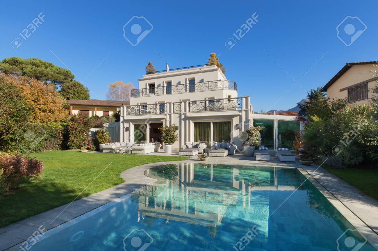 Beautiful House With Pool Blue Sky And Lush Garden Stock Photo Picture And Royalty Free Image Image 53274114