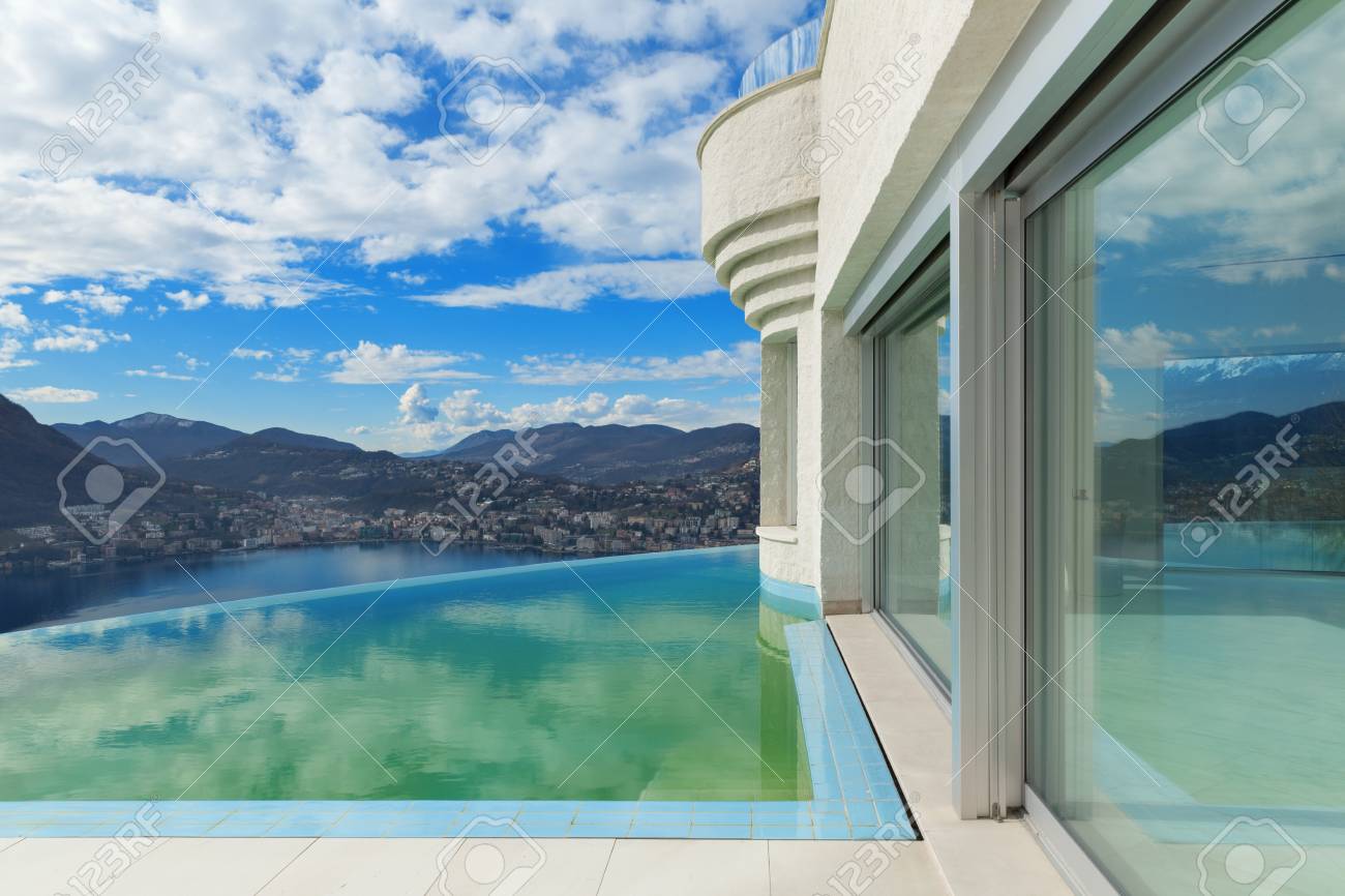 infinity pool house residential beautiful landscape from modern house with infinity pool stock photo 54366391 beautiful landscape from modern house with infinity pool infinity pool house residential beautiful landscape from modern house with infinity pool stock photo 54366391 beautiful landscape from modern house with infinity pool