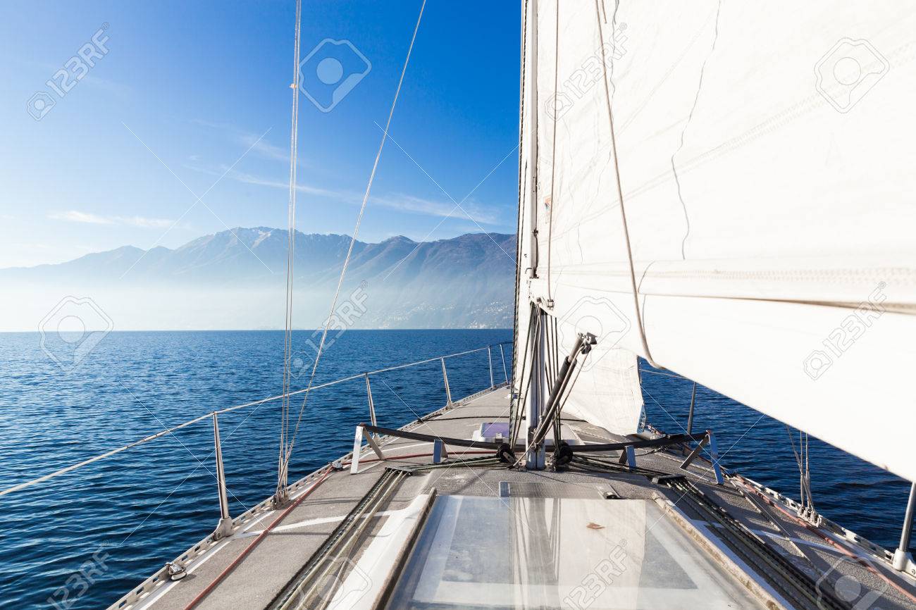 Sailing boat in sunny day in the lake - 58767558 Sailing boat in sunny day in the lake - 58767558
