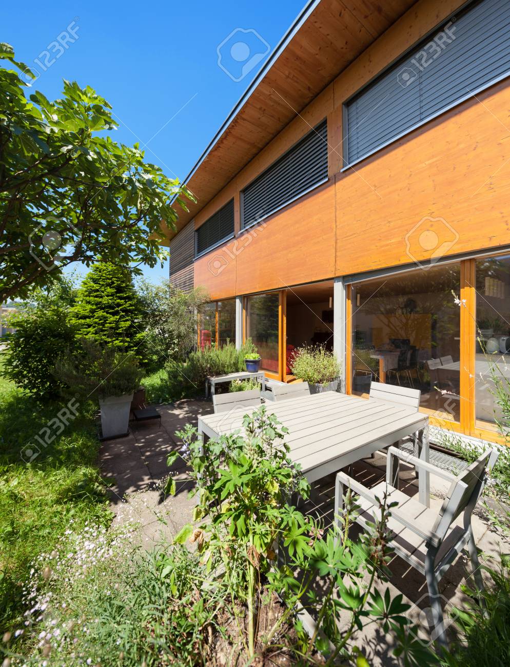 Stock photo veranda of a wooden house modern design
