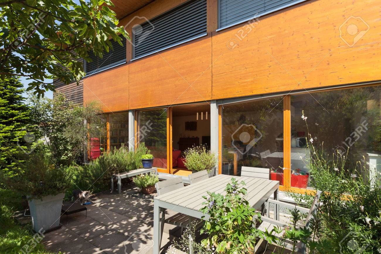 Stock photo veranda of a wooden house modern design