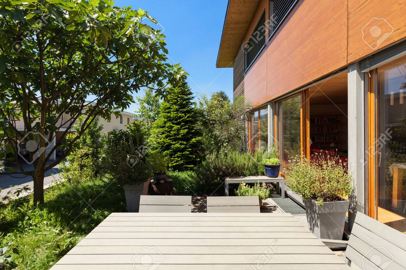 Stock photo veranda of a wooden house modern design