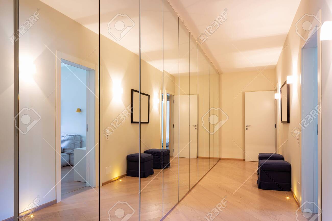 Corridor With Wardrobes And Mirrors Nobody Inside Stock Photo