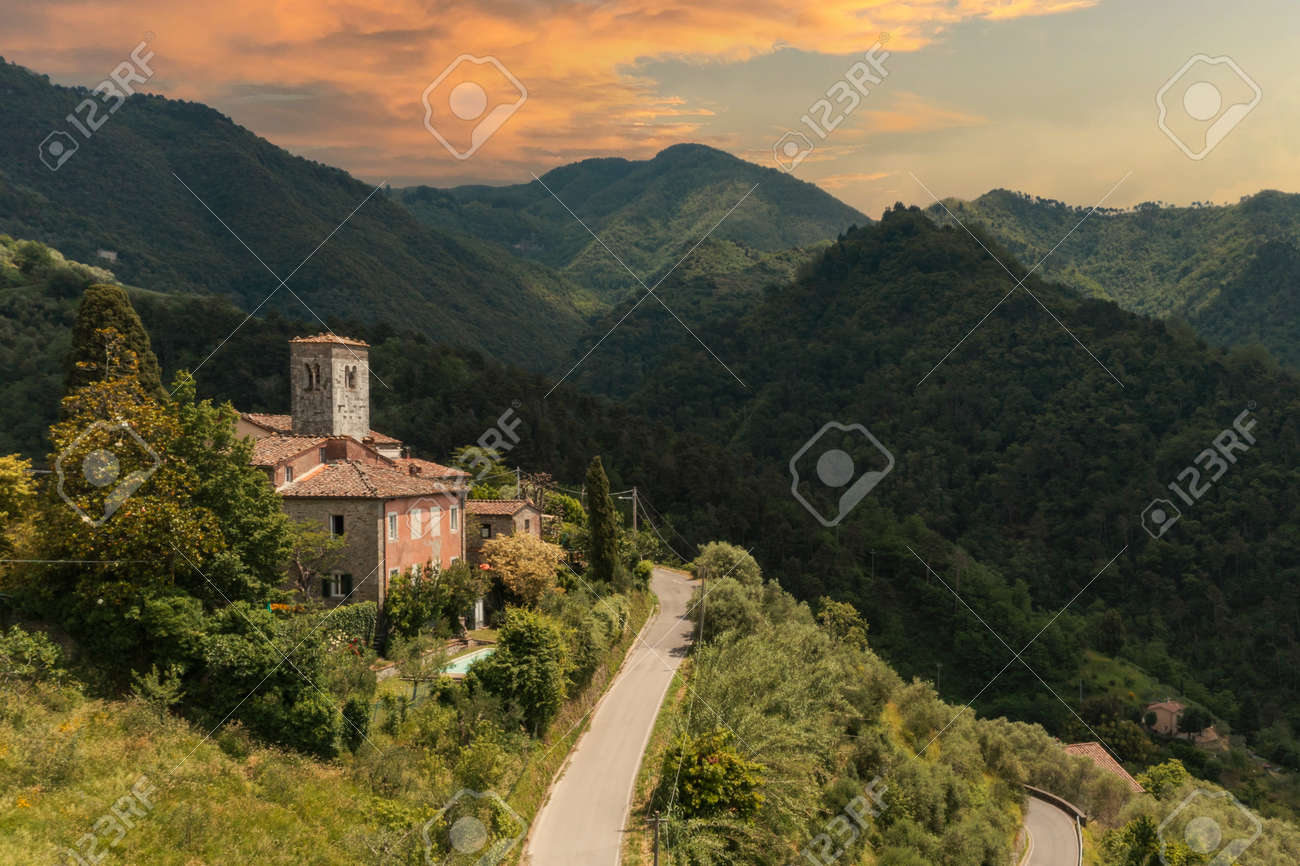 House or cottage in the middle of summer with a beautiful garden and swimming pool in Tuscany. The place is romantic and makes you dream. The shot was done with a drone. Italy always beautiful - 171317455 House or cottage in the middle of summer with a beautiful garden and swimming pool in Tuscany. The place is romantic and makes you dream. The shot was done with a drone. Italy always beautiful - 171317455