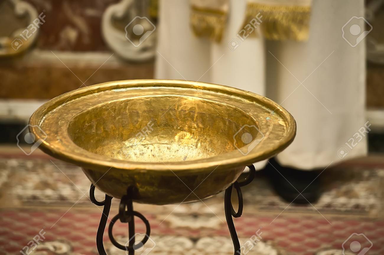 Evocative Image Of Catholic Baptism With The Golden Bowl To Put Stock Photo Picture And Royalty Free Image Image 92734945