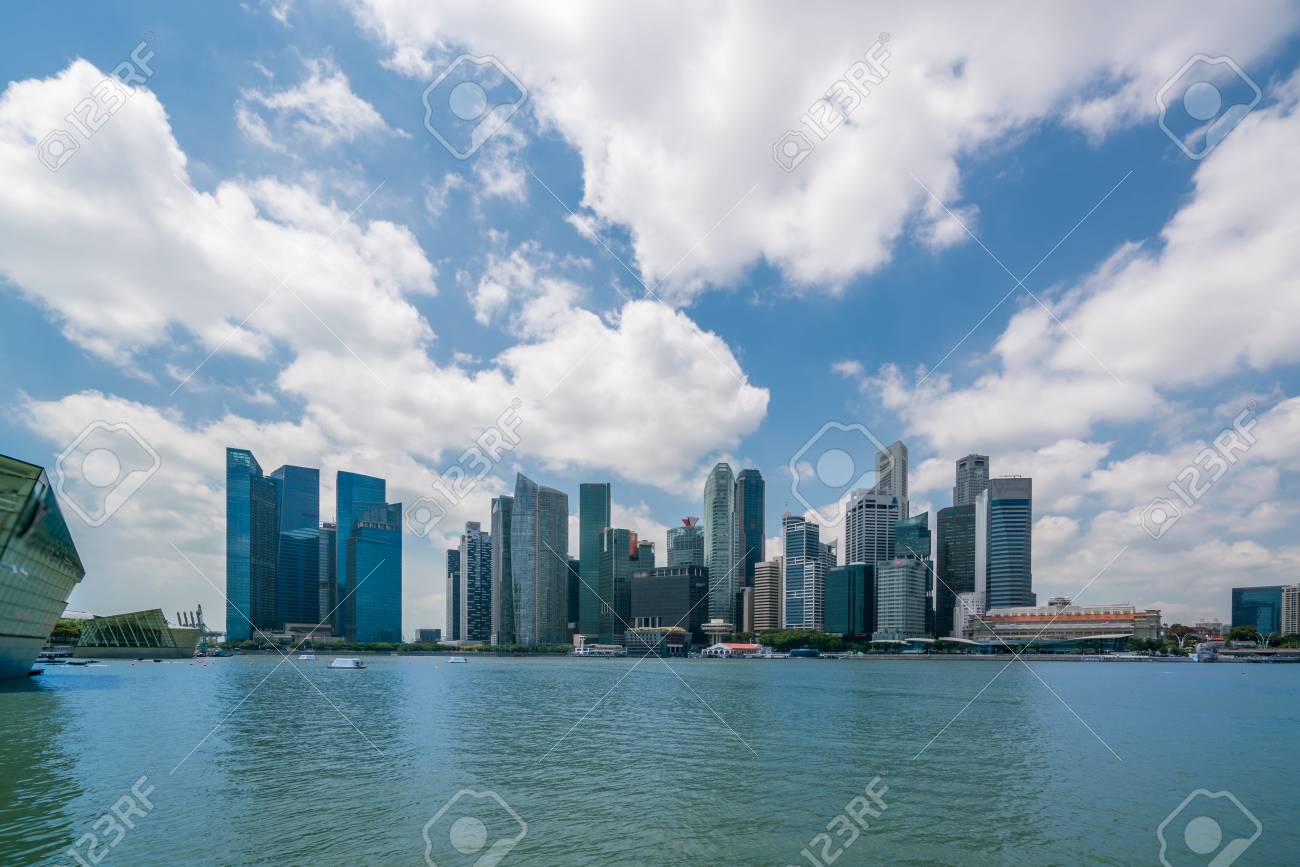 Singapore Central Business District Skyline, Blue Sky And Clouds At Marina  Bay. Singapore City Skyline. Singapore Cityscape. Stock Photo, Picture and  Royalty Free Image. Image 76219968.