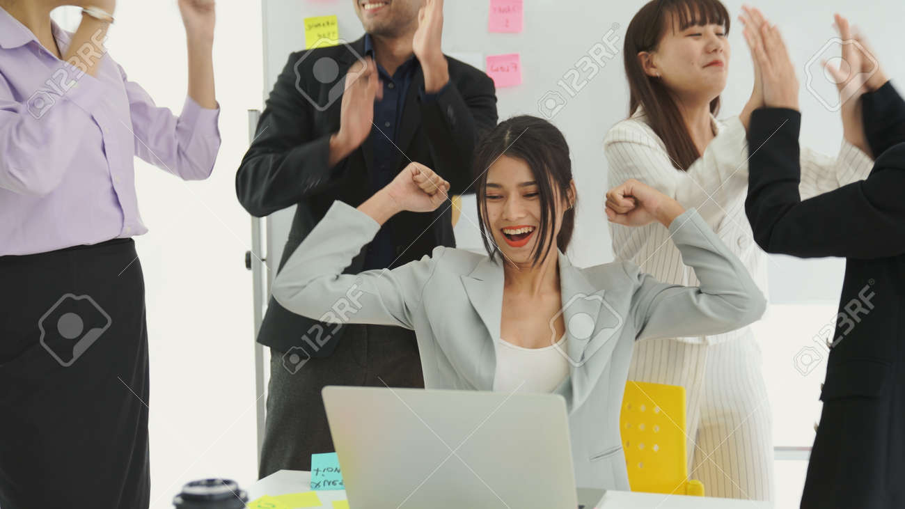 Business people celebrate success of proficiently finished project . Corporate business team collaboration concept . - 171925196 Business people celebrate success of proficiently finished project . Corporate business team collaboration concept . - 171925196