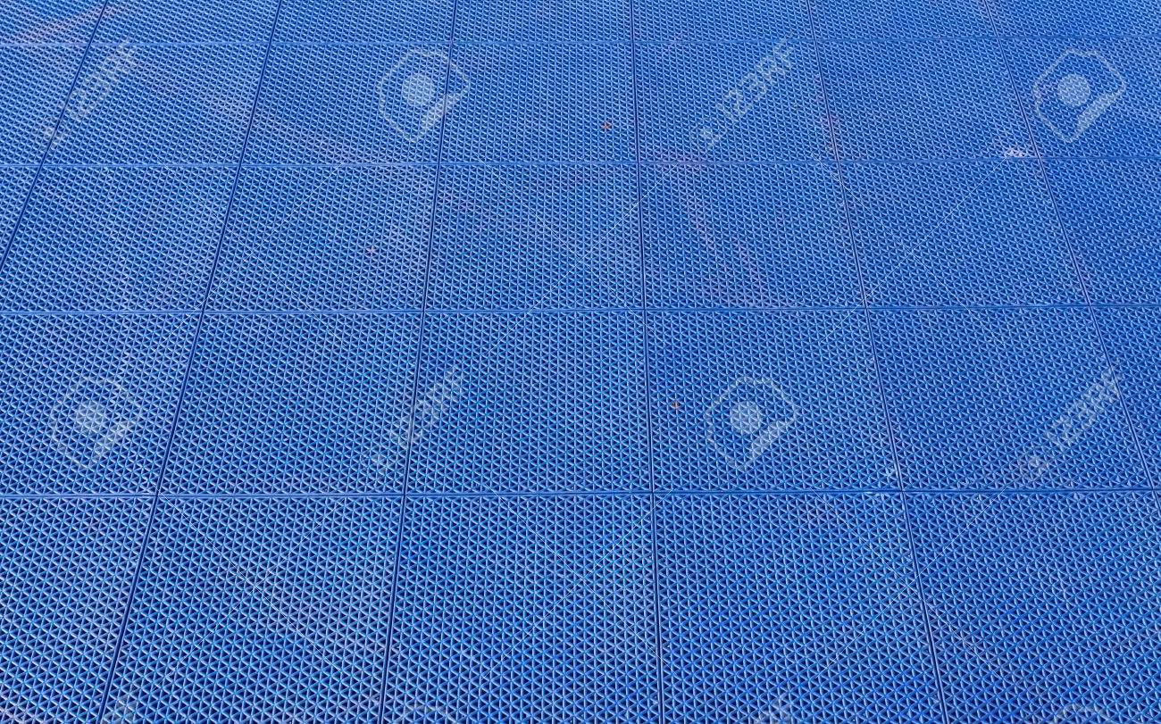Blue Rubber Flooring On Futsal Field Background Stock Photo Blue Rubber Flooring On Futsal Field Background Stock Photo
