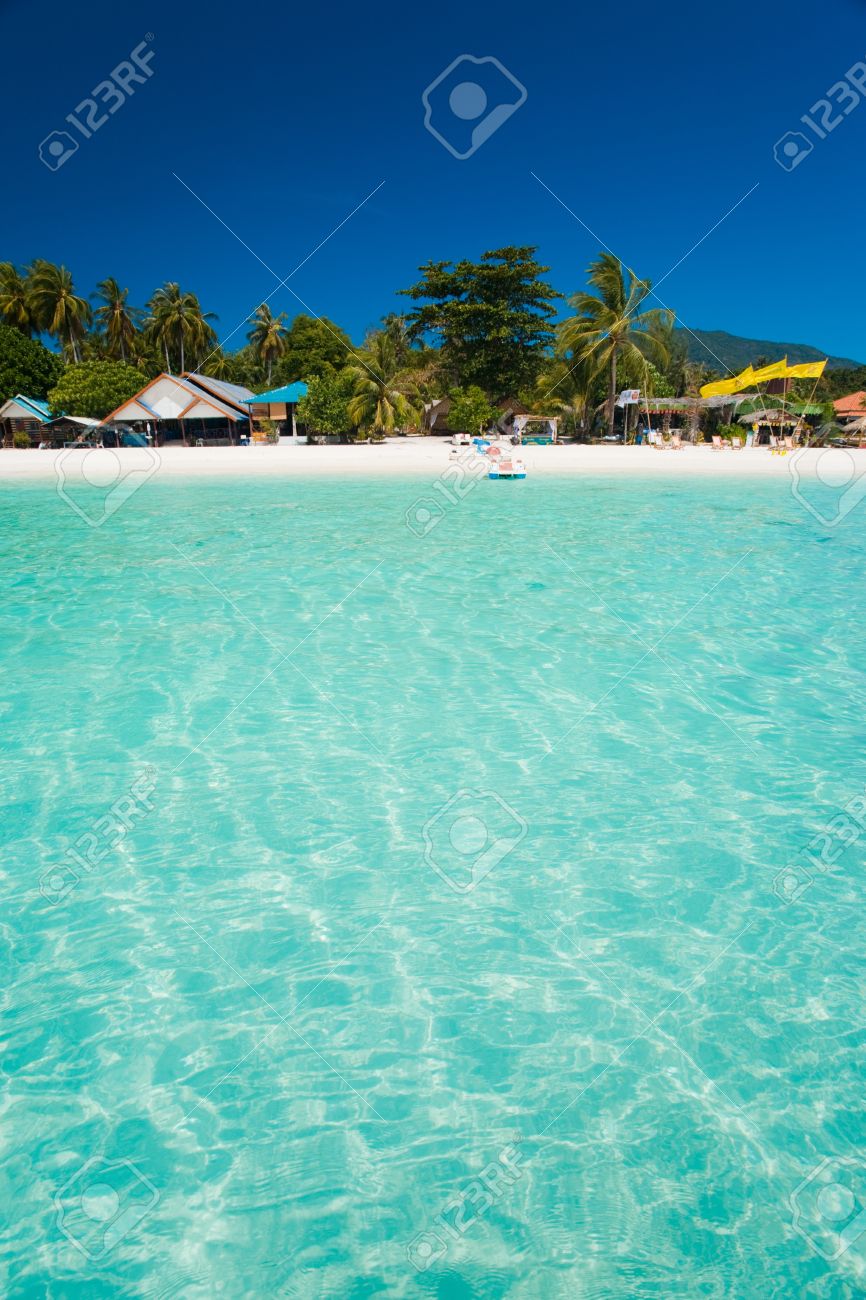 A Truly White Sand Beach And Crystal Clear Water Resembling A