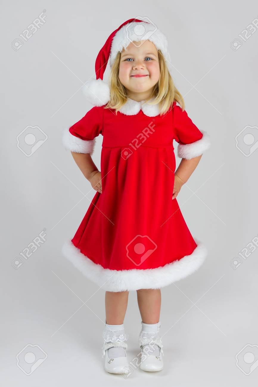 赤いクリスマス衣装で甘い女の子 の写真素材 画像素材 Image