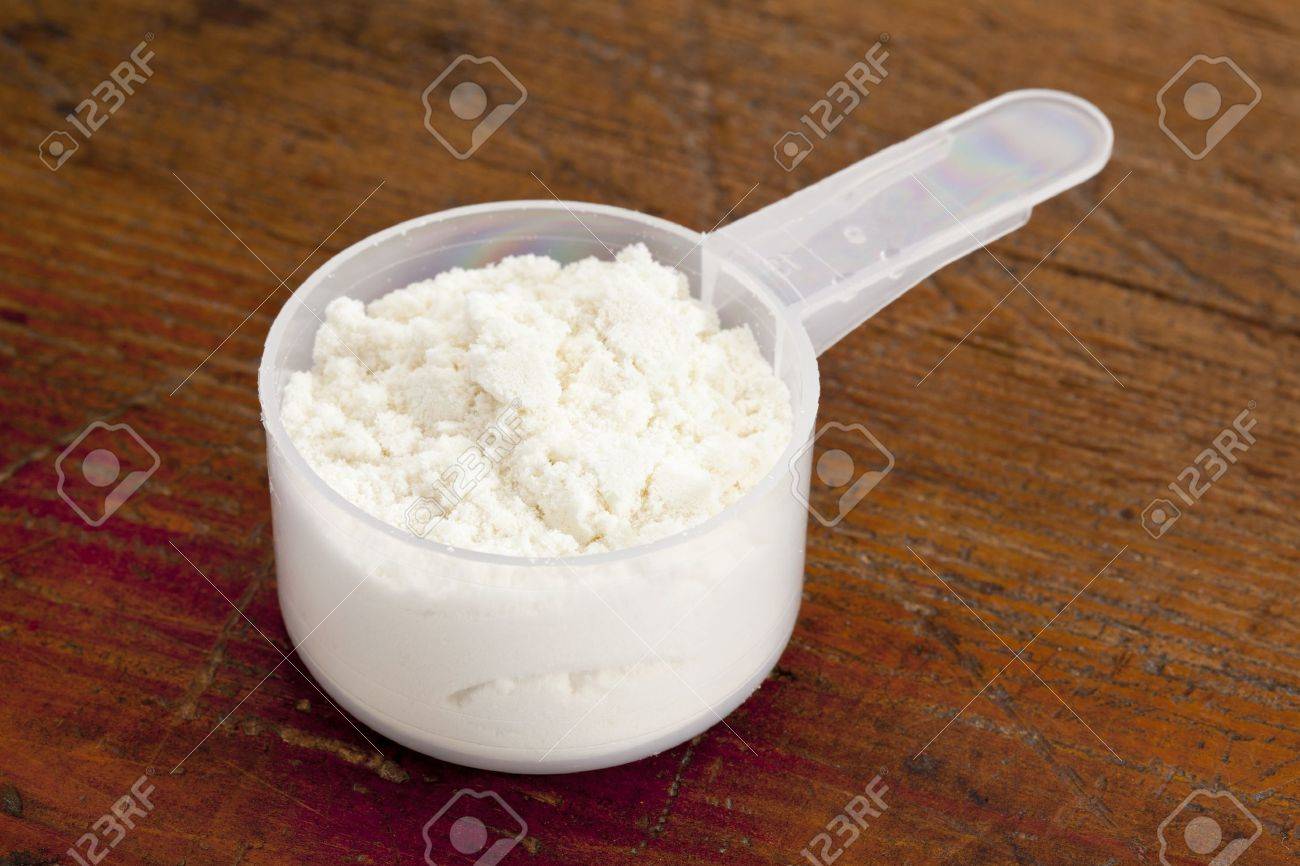 Download Plastic Measuring Scoop Of White Powder Whey Protein Against Stock Photo Picture And Royalty Free Image Image 11577554 Yellowimages Mockups
