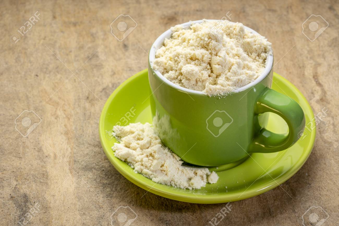 Whey Protein Powder In A Coffee Cup Against Textured Bark Paper Stock Photo Picture And Royalty Free Image Image 119612872