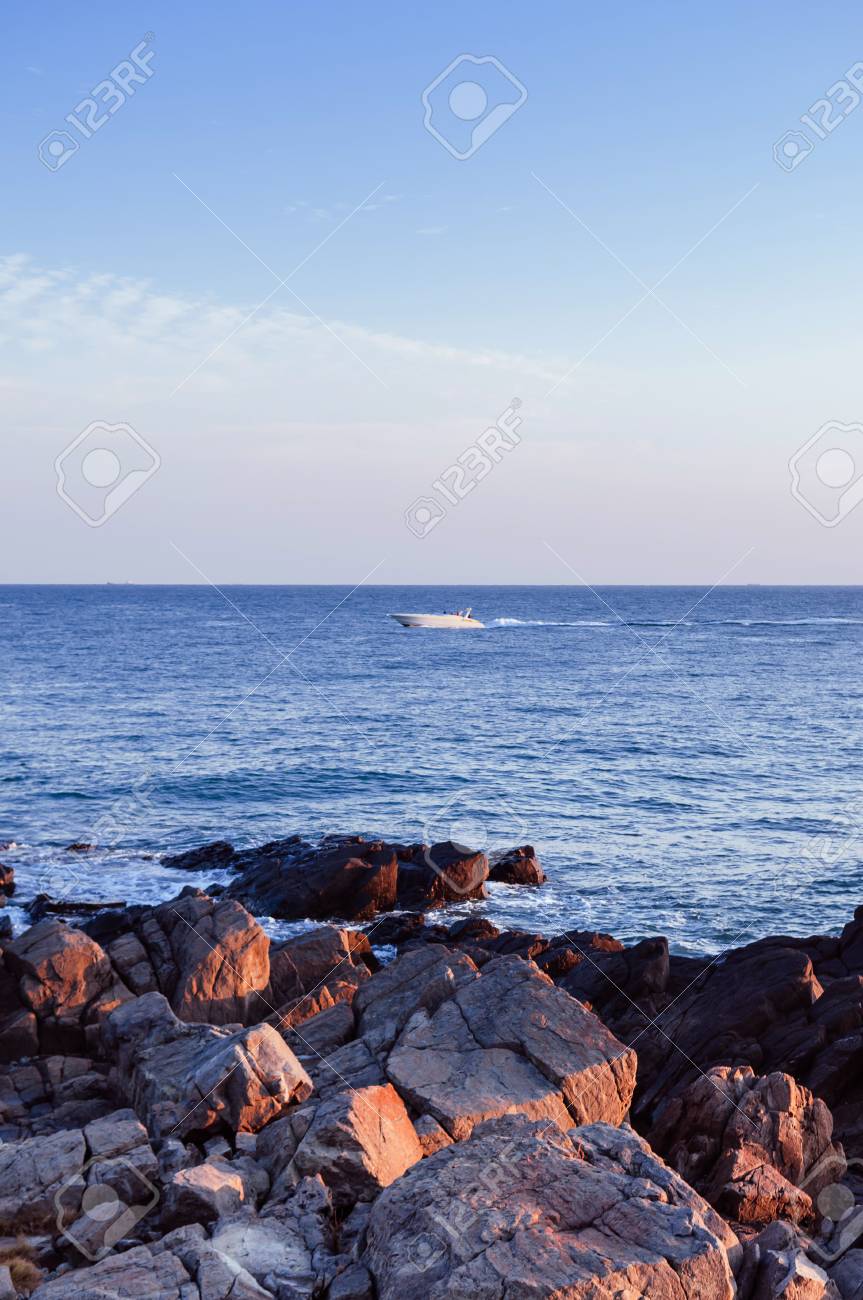 Boat And Rock Beach Dongbaek Island Sunset In The Haeundae District