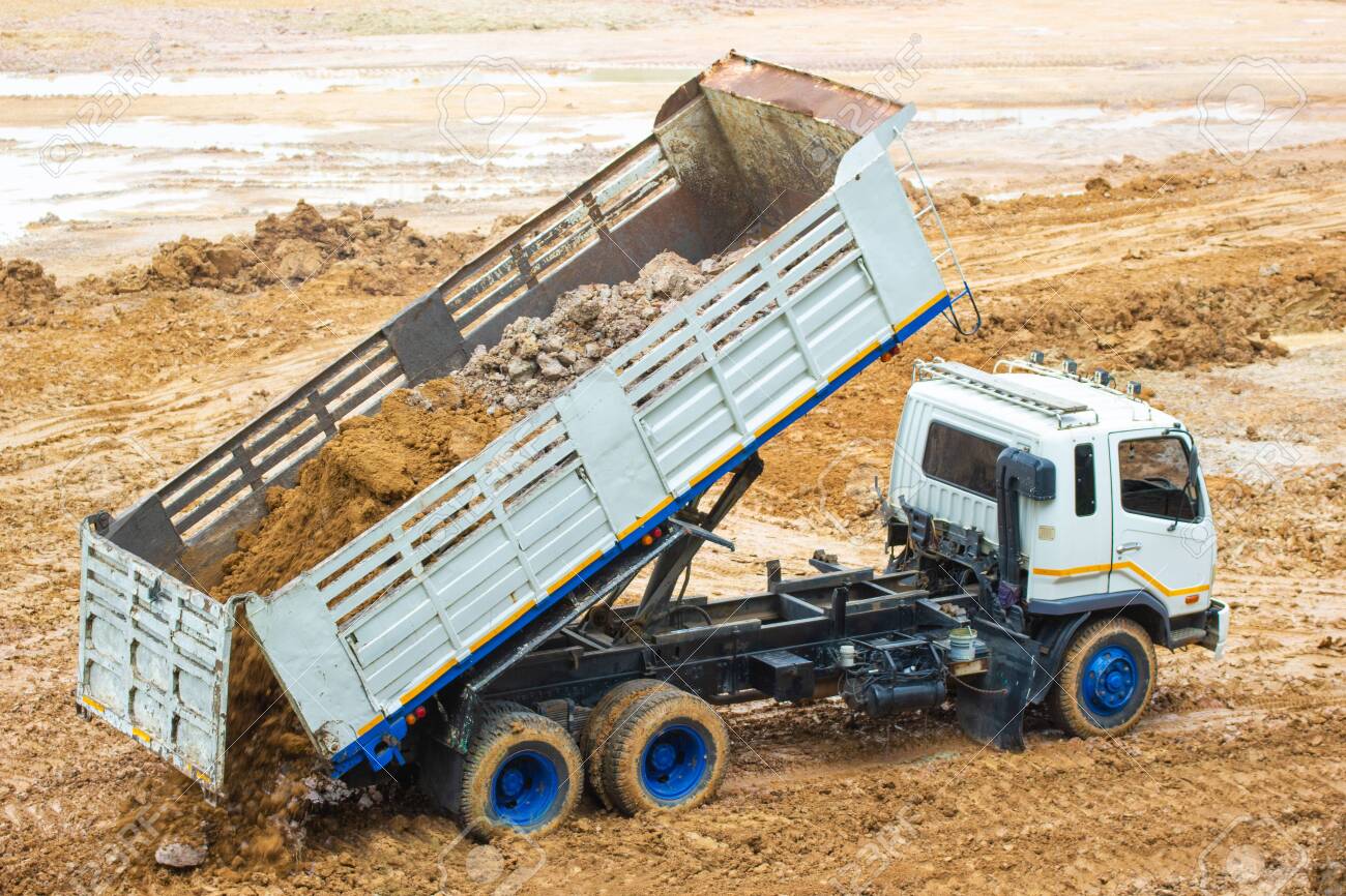 Big Dump Trucks >> Big Dump Truck Working Delivery Of Sand To The Construction Site Big Dump Trucks >> Big Dump Truck Working Delivery Of Sand To The Construction Site