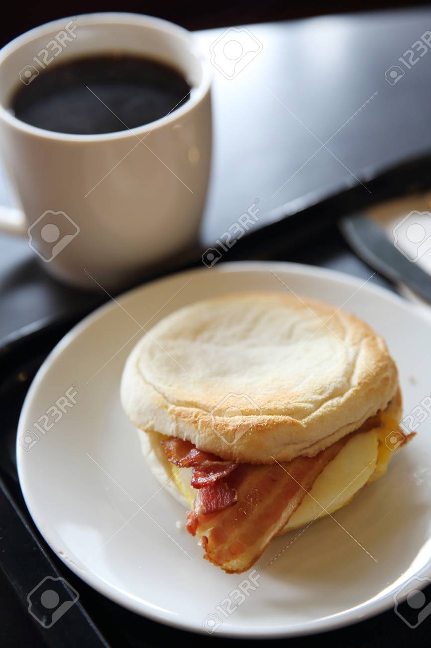 Bacon And Fried Egg Roll With Coffee Stock Photo Picture And