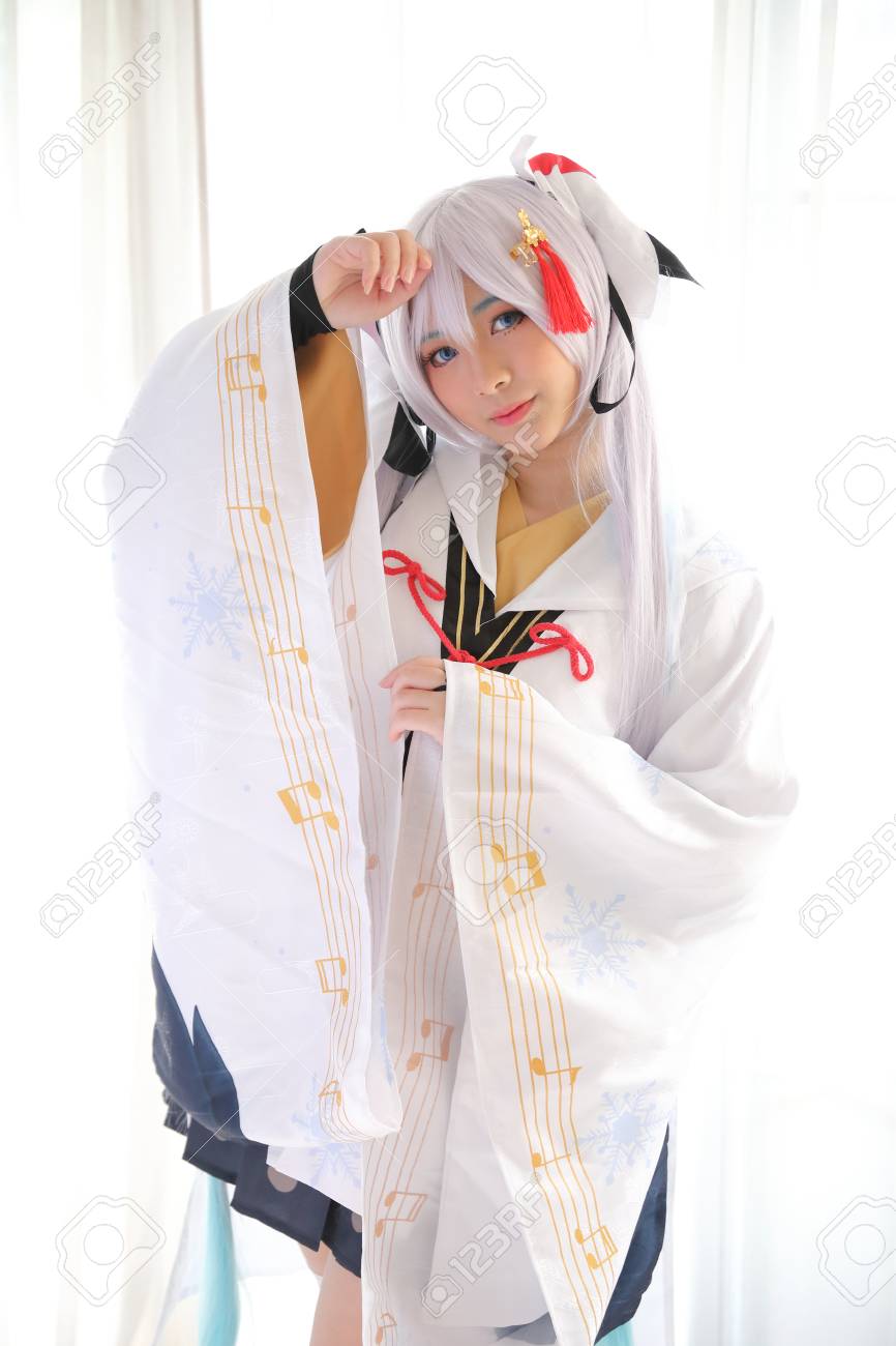 Japan Anime Cosplay White Japanese Miko In White Tone Room Stock